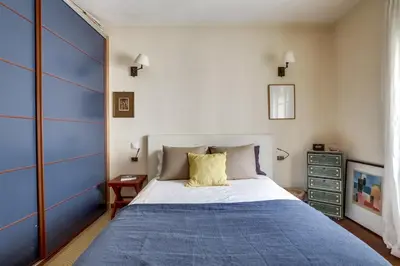 Un ou plusieurs lits dans un hébergement de l'établissement Apartment Tour Eiffel by Weekome