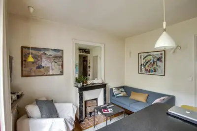 Coin salon dans l'établissement Apartment Tour Eiffel by Weekome