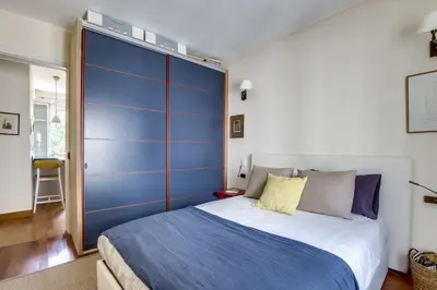 Un ou plusieurs lits dans un hébergement de l'établissement Apartment Tour Eiffel by Weekome
