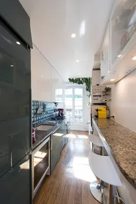 Cuisine ou kitchenette dans l'établissement Veeve - By the Palais Royal