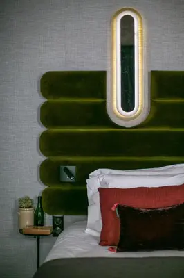 Un ou plusieurs lits dans un hébergement de l'établissement La Planque Hotel