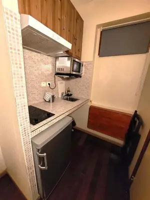 Cuisine ou kitchenette dans l'établissement Résidence Molière Hôtel Paris Montrouge