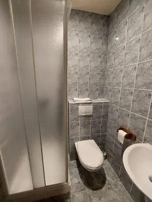Salle de bains dans l'établissement Résidence Molière Hôtel Paris Montrouge