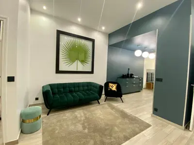 Coin salon dans l'établissement Appartement République