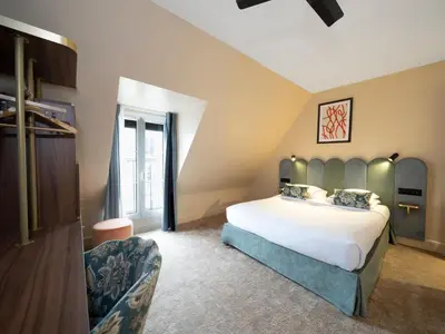 Un ou plusieurs lits dans un hébergement de l'établissement Hotel Boronali