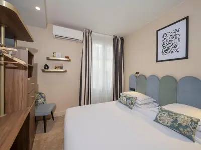 Un ou plusieurs lits dans un hébergement de l'établissement Hotel Boronali