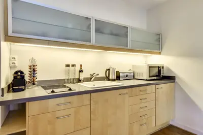 Cuisine ou kitchenette dans l'établissement Stylish Loft in Saint-Germain Des Près