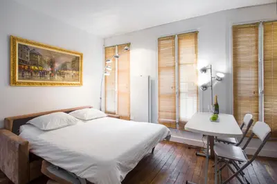 Un ou plusieurs lits dans un hébergement de l'établissement Loft Magenta Blue