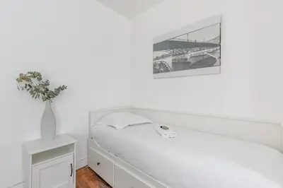 Un ou plusieurs lits dans un hébergement de l'établissement Loft Magenta Blue