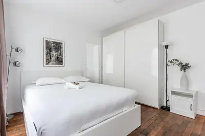 Un ou plusieurs lits dans un hébergement de l'établissement Loft Magenta Blue