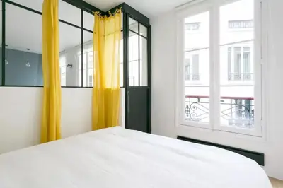 Un ou plusieurs lits dans un hébergement de l'établissement Appt central & cosy au cœur de Saint-Germain-des-Prés