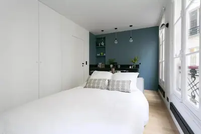 Un ou plusieurs lits dans un hébergement de l'établissement Appt central & cosy au cœur de Saint-Germain-des-Prés