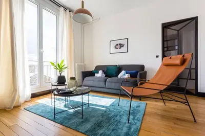 Coin salon dans l'établissement Appt calme central avec balcon - Opéra - Haussmann