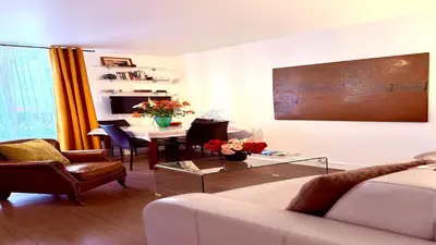 Coin salon dans l'établissement Charming Apartment near The Eiffel Tower