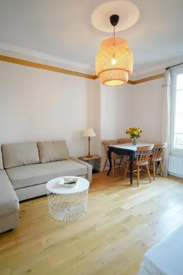 Coin salon dans l'établissement Villa Escudier Appart-hôtel