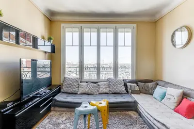 Coin salon dans l'établissement Appartement moderne à Saint-Denis - 65 m² avec balcon