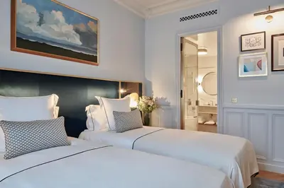 Un ou plusieurs lits dans un hébergement de l'établissement Grand Powers Hotel