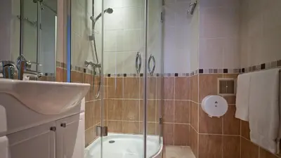 Salle de bains dans l'établissement Hotel Le Clos d'Alésia