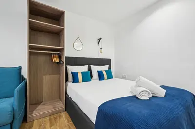 Un ou plusieurs lits dans un hébergement de l'établissement Tour Eiffel Apartment
