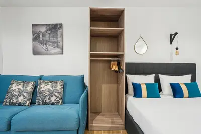 Un ou plusieurs lits dans un hébergement de l'établissement Tour Eiffel Apartment
