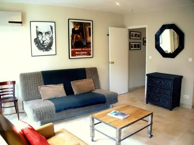 Coin salon dans l'établissement Appartement clair et lumineux au centre de Paris