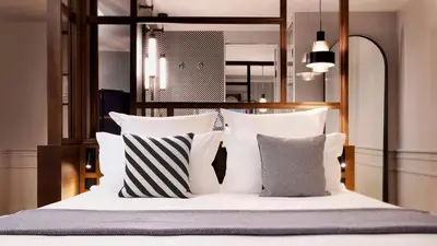 Un ou plusieurs lits dans un hébergement de l'établissement Maison ELLE Paris