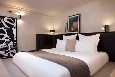 Un ou plusieurs lits dans un hébergement de l'établissement Maison ELLE Paris