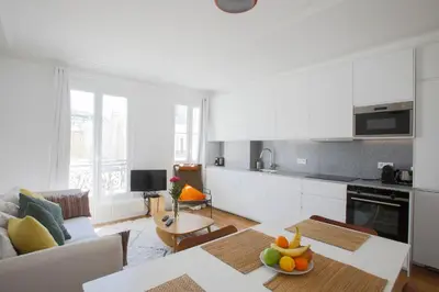 Cuisine ou kitchenette dans l'établissement Appartement familial calme près de la Tour Eiffel