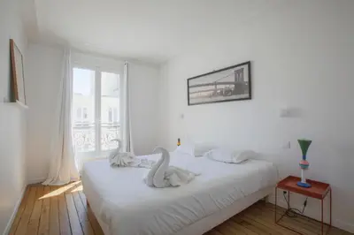 Un ou plusieurs lits dans un hébergement de l'établissement Appartement familial calme près de la Tour Eiffel