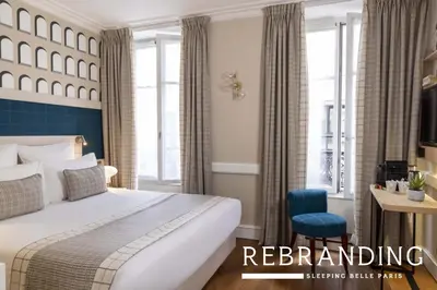 Un ou plusieurs lits dans un hébergement de l'établissement Hotel Sleeping Belle - Gare de Lyon Bastille