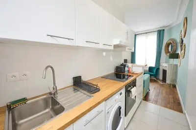 Cuisine ou kitchenette dans l'établissement Très cosy 45m2, proche du parc des expositions