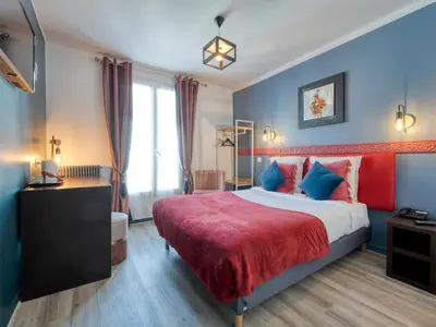 Un ou plusieurs lits dans un hébergement de l'établissement Hotel de Belfort