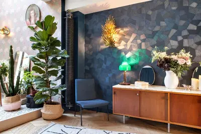 Coin salon dans l'établissement Hôtel Henriette