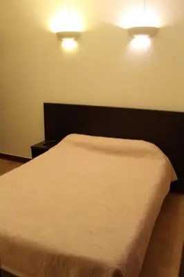 Un ou plusieurs lits dans un hébergement de l'établissement Hotel Anya