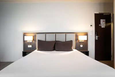 Un ou plusieurs lits dans un hébergement de l'établissement Hotel de Flore - Montmartre