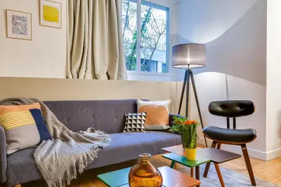 Coin salon dans l'établissement LE VAUGIRARD - 3bedrooms Apartment Premium