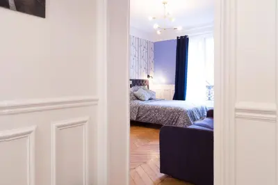 Un ou plusieurs lits dans un hébergement de l'établissement RESIDENCE LANCASTER
