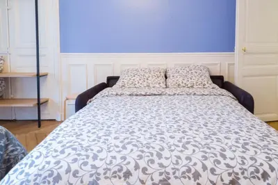 Un ou plusieurs lits dans un hébergement de l'établissement RESIDENCE LANCASTER