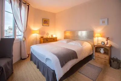 Un ou plusieurs lits dans un hébergement de l'établissement Chambres d'hôtes La Maison Hippolyte