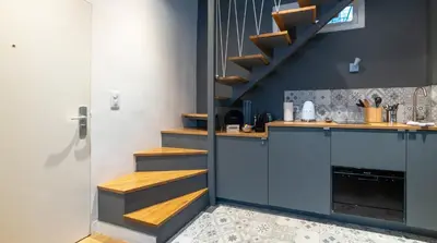 Cuisine ou kitchenette dans l'établissement Midoon guest - DUPLEX D'ARCHITECT PARIS 10ème