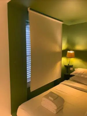 Un ou plusieurs lits dans un hébergement de l'établissement Midoon guest - DUPLEX D'ARCHITECT PARIS 10ème