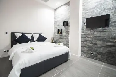 Un ou plusieurs lits dans un hébergement de l'établissement Dreamyflat - Loft Louvre