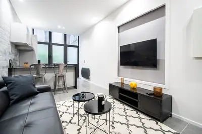 Télévision ou salle de divertissement dans l'établissement Dreamyflat - Loft Louvre