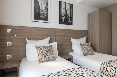 Un ou plusieurs lits dans un hébergement de l'établissement Best Western Paris Porte de Versailles
