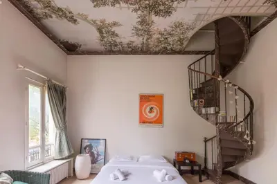 Un ou plusieurs lits dans un hébergement de l'établissement Veeve - Charming Townhouse near Parc Montsouris