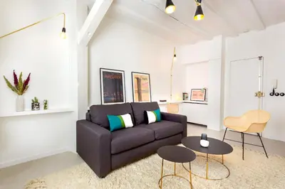 Coin salon dans l'établissement Habitat Parisien - Montorgueil Suite