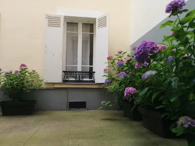 Jardin de l'établissement La Cour du 5ème - Chambre d'hôtes