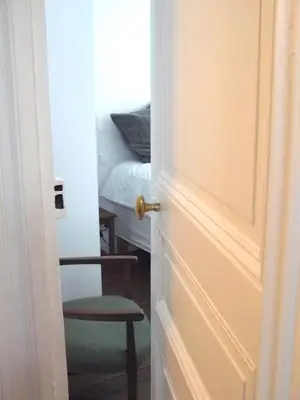 Un ou plusieurs lits dans un hébergement de l'établissement La Cour du 5ème - Chambre d'hôtes