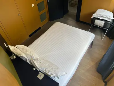 Un ou plusieurs lits dans un hébergement de l'établissement Appartement Censier Daubenton