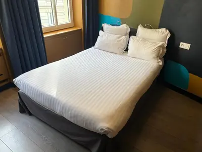 Un ou plusieurs lits dans un hébergement de l'établissement Appartement Censier Daubenton